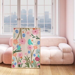 Pretty art print featuring three abstract blue birds perching on wildflowers and foliage, on a cream background.