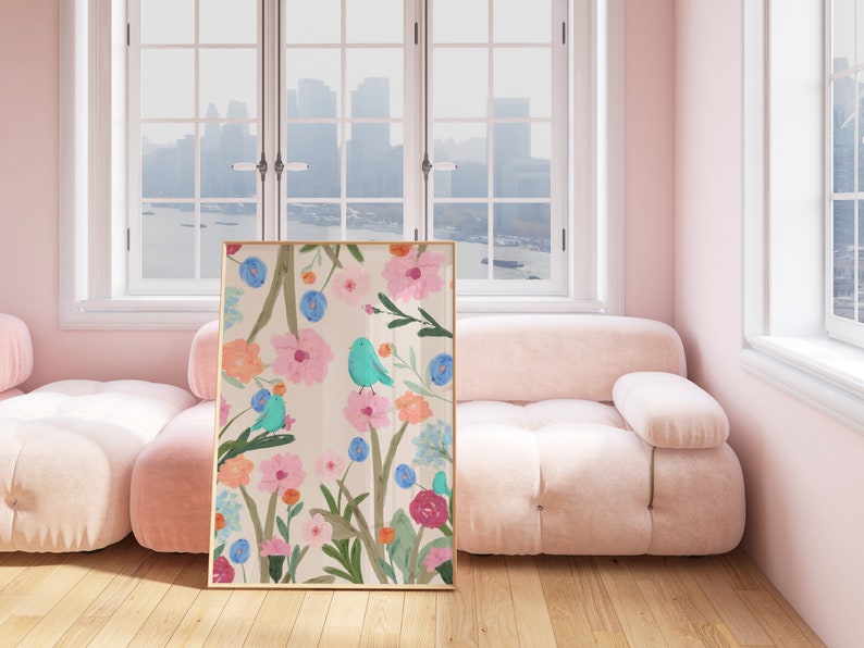 Pretty art print featuring three abstract blue birds perching on wildflowers and foliage, on a cream background.