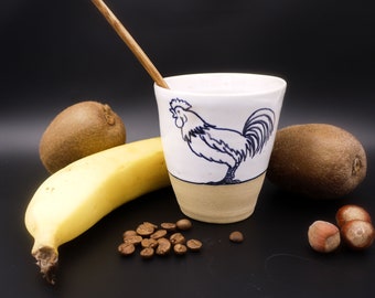Ceramic coffee cup sand and white rooster pattern