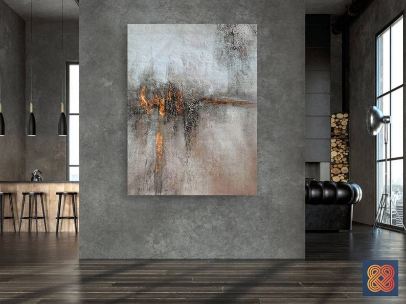 May include: Abstract painting with shades of gray, brown, and gold. The painting has a textured surface and a horizontal line of gold paint across the middle.