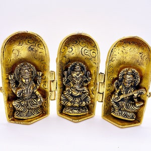 Antique Gold Plated Book Shape Ganesh Laxmi Saraswati Statue Idol Showpiece
