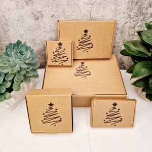 Empty Christmas Gift Box. Mini Small Medium Cardboard Postage Box With Christmas Tree. Unique Eco Friendly Recyclable Sustainable Packaging