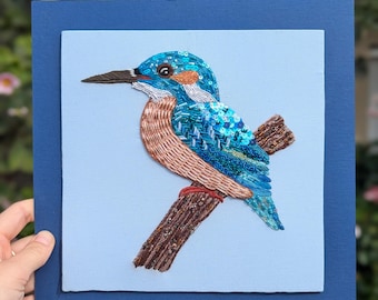 Eisvogel umrahmte Stickerei