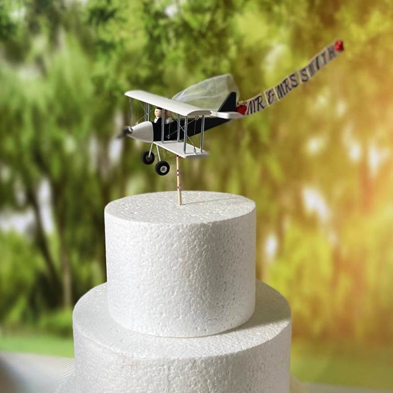 Airplane Wedding Cake Topper with Custom banner Mr. & Mrs. Marriage cute unique honeymoon figurines at the helm of the plane. image 2