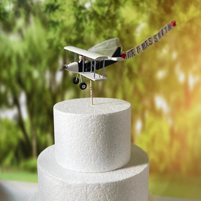 Airplane Wedding Cake Topper with Custom banner Mr. & Mrs. Marriage cute unique honeymoon figurines at the helm of the plane. image 8