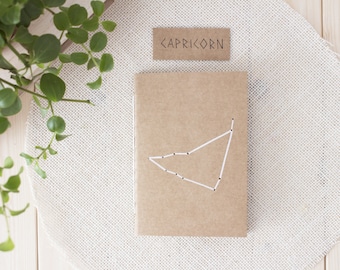 Capricorn zodiac journal of sustainable papers, Hand-sewn eco-friendly perforated stars mini notebook, Rustic gift for constellation lovers