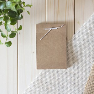 Bloc de notas hecho de papeles ecológicos, cartón de muestra de papeles sostenibles para mejores compras en línea, cero residuos rústicos y cuadernos boho