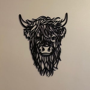 Geometric  Highland Cow designed wall art.