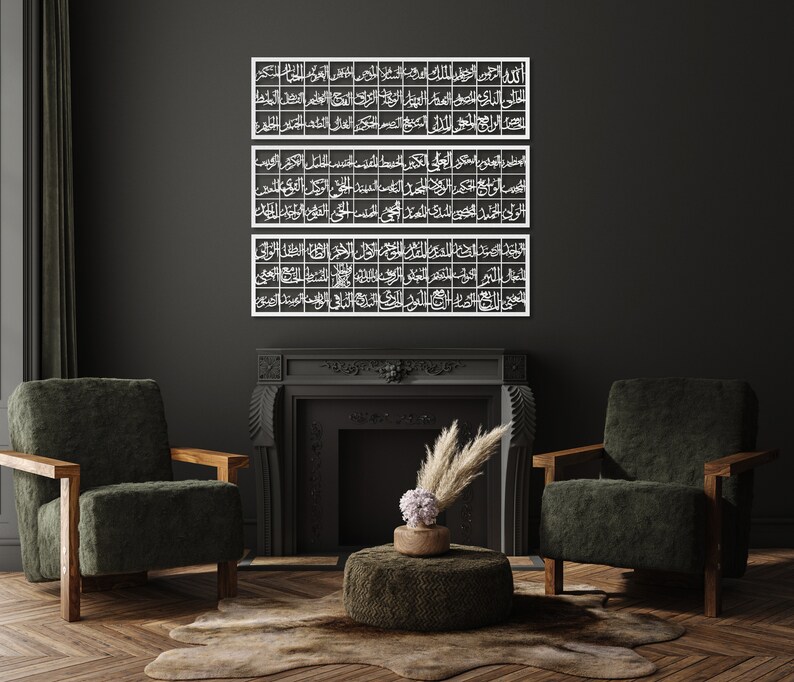 May include: Three white metal wall art pieces with Arabic calligraphy in a dark room with a fireplace and two green armchairs.