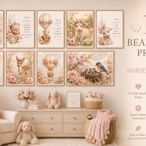 May include: A collection of ten wall art prints featuring soft-toned illustrations of a crescent moon, teddy bears, hot air balloons, a lamb, a deer, and birds in a nest, displayed above a dresser with plush toys and a wicker basket.