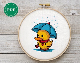 アヒルの子のクロスステッチパターン、傘を持ったアヒルの刺繍絵、雨の