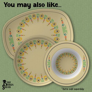May include: A set of four beige-colored plates and bowls with a retro design. The plates and bowls have a repeating pattern of yellow, green, and blue shapes. The text "You may also like..." is at the top.