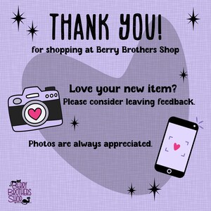 May include: A purple background with the text "THANK YOU!" and "for shopping at Berry Brothers Shop." A camera and phone with hearts are illustrated. The text "Love your new item? Please consider leaving feedback. Photos are always appreciated." is also included.