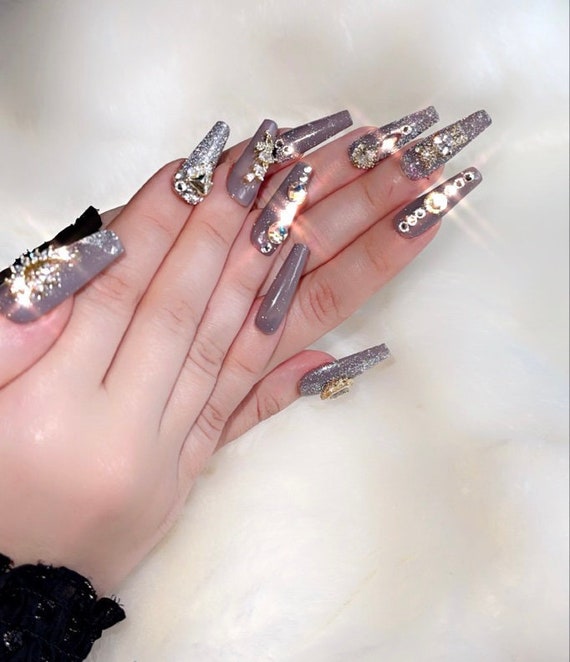 Elevate Your Nail Designs with Swarovski Crystals 