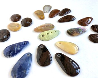 Large teardrop and oval stones and shells