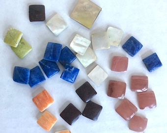 Lot of small square cabochon stones and shells