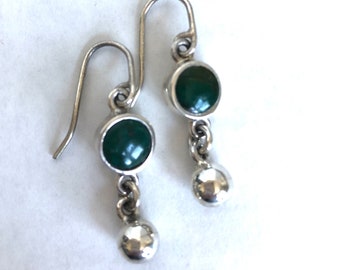 Handmade Turquoise earrings set in sterling silver with a flirty silver drop