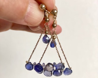 Fan shaped sterling silver earrings with faceted iolite drop