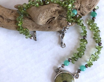 Handmade Serpentine necklace set in sterling silver with Peridot and Amazonite beads.