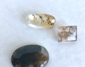 three beautiful pieces of dentreic quartz (2 look like landscapes)