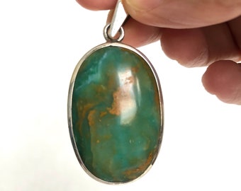 Handmade very large and unique Peruvian Opal pendant set in sterling silver