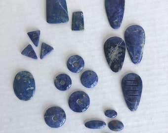 Large lot of Sodalite cabochons in mixed shapes and sizes