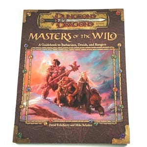 May include: A hardcover book titled "Dungeons & Dragons MASTERS OF THE WILD". The cover features a fantasy illustration of a warrior, a druid, and a bear-like creature in a snowy landscape. The book is a guidebook to Barbarians, Druids, and Rangers.