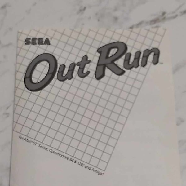 Game Manual for Out Run for the Commodore 64, the Commodore 128, The Atari ST series, and the Amiga