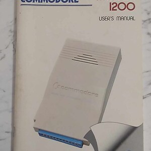 Boxed 1200 Baud Commodore Modem model 1670 With User Manual, Telephone ...