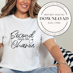 May include: White t-shirt with black text that reads "Second time's the charm" with a veil and ring graphic.