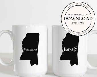 May include: Two white coffee mugs with black outlines of the state of Mississippi. One mug says "Mississippi" and the other says "home" with a heart.