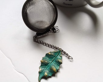 Infuseur à thé en filet avec breloque feuille de turquoise