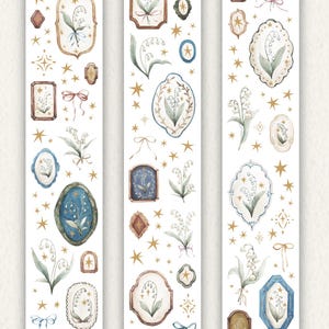 May include: Three decorative sticker strips with watercolour illustrations of lily of the valley flowers, framed designs, bows, and gold stars on a white background. The designs include various shapes and colours.