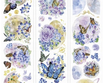 Puede incluir: Cinta adhesiva decorativa con ilustraciones de acuarela de lunas, mariposas, flores y planetas. El diseño incluye tonos de azul, morado, amarillo y marrón, creando una estética caprichosa. Ideal para scrapbooking y manualidades.