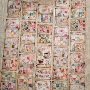 May include: A collection of vintage-style decorative stickers with floral and patchwork designs. The stickers feature a variety of colors, including pink, blue, yellow, and green. Some stickers depict teacups and floral arrangements. Rolls of matching washi tape are also visible.