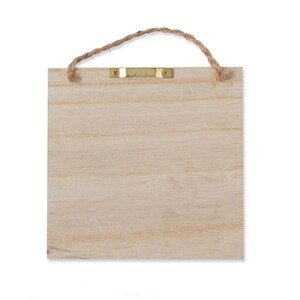 May include: A blank wooden sign with a jute rope hanger and a metal hook. The sign is light brown and has a natural wood grain.