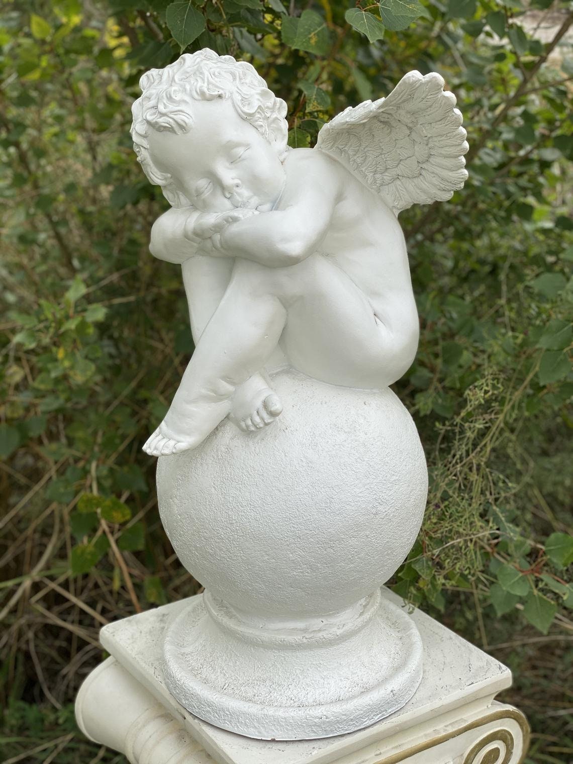 White angel sleeps resin statue Cherub on a ball garden Etsy