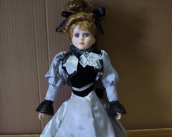 Beautiful Porcelain Doll in Silver and Black Gown