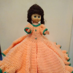Pretty little Plastic doll wearing Hand Crochet Dress