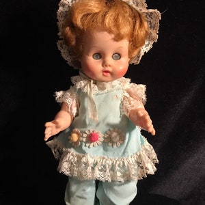 Ginny Baby from Vogue Doll with original clothes.