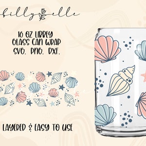 May include: A layered design for a 16 oz Libbey glass can wrap featuring a seashell pattern in shades of blue, pink, and cream. The design includes seashells, starfish, and bubbles. The text "16 oz Libbey Glass Can Wrap SVG. PNG. DXF." and "Layered & Easy to Use" is included in the design.