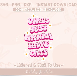 May include: Pink and white graphic design with the text "Girls Just Wanna Have Cats" in a retro style with white daisies surrounding the text.
