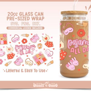 May include: A 20 ounce glass can wrap design featuring a pink and red illustration of pajamas, bunny slippers, eye masks, and the text "pajamas all day".