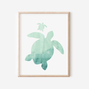May include: A watercolour painting of two sea turtles, one large and one small, in shades of teal and green. The turtles are silhouetted against a white background.