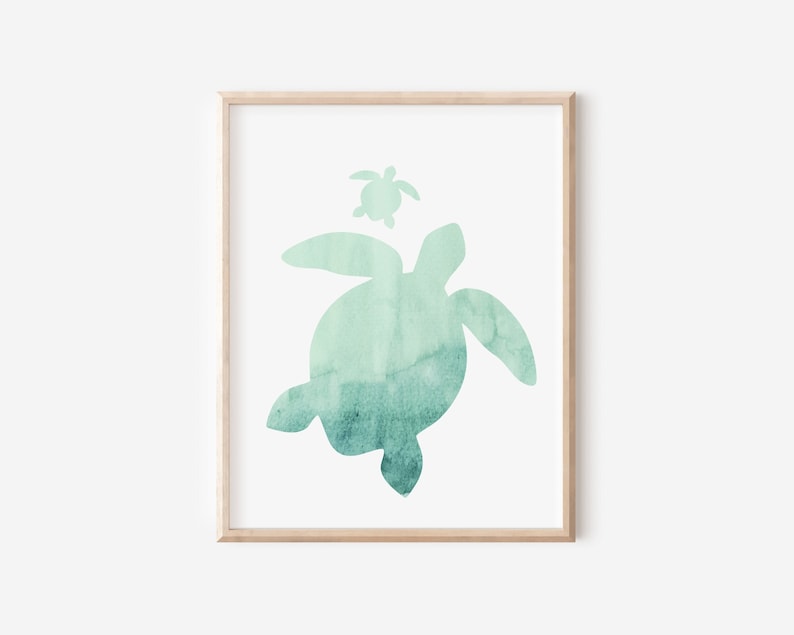 May include: A watercolour painting of two sea turtles, one large and one small, in shades of teal and green. The turtles are silhouetted against a white background.