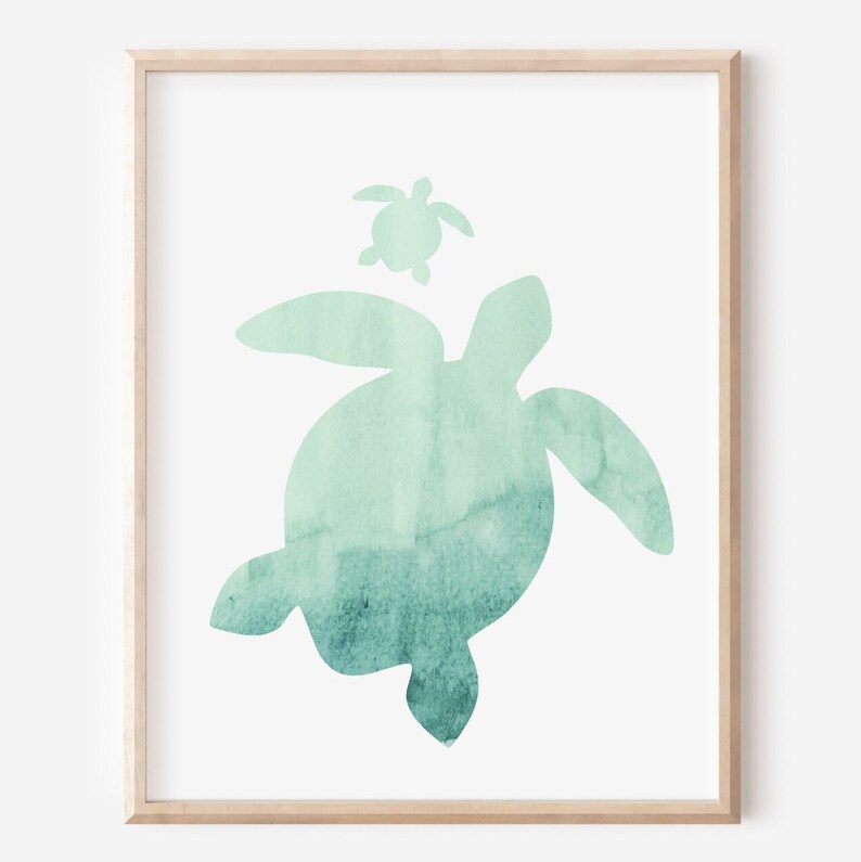 May include: A watercolour painting of two sea turtles, one large and one small, in shades of teal and green. The turtles are silhouetted against a white background.