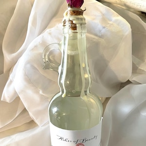 Lyxigt flytande bubbelbad i elegant glasflaska