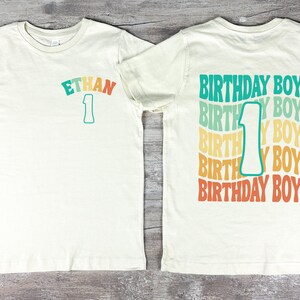 two birthday shirts with the number 1 on them