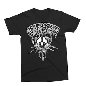 May include: Black t-shirt with a white graphic of a skull and the text "DEATH CYCLES" in a dripping font. The skull design has a stylized, edgy aesthetic, with sharp lines and a bold visual impact. The shirt is a classic crew neck style.