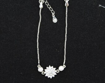 Sterling Silver Bracelet: Floral CZ Centerpiece - Adjustable Size